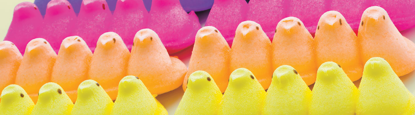 Image of rows of pink, orange, yellow peeps